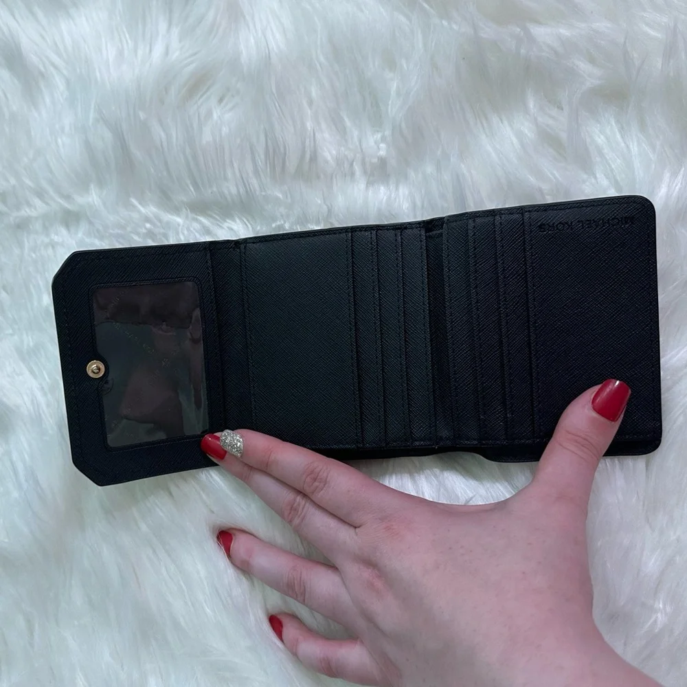 Michael Kors NWOT beautiful and basic black leather wallet